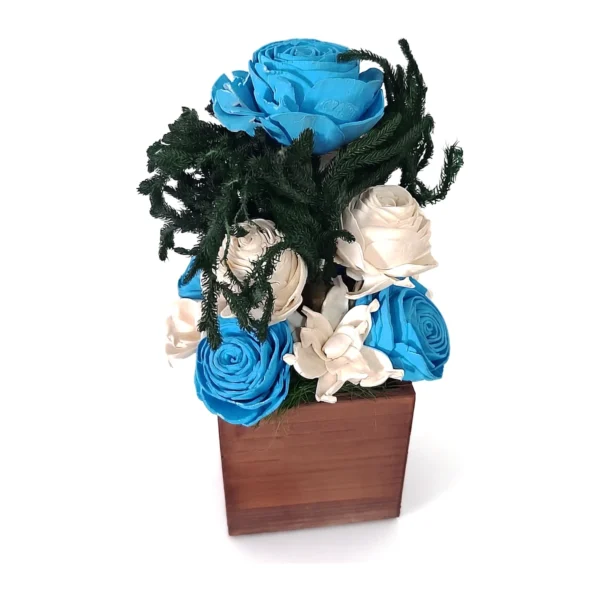 Arrangement AR39: a square wooden pot filled with turquoise-blue and ivory sola roses