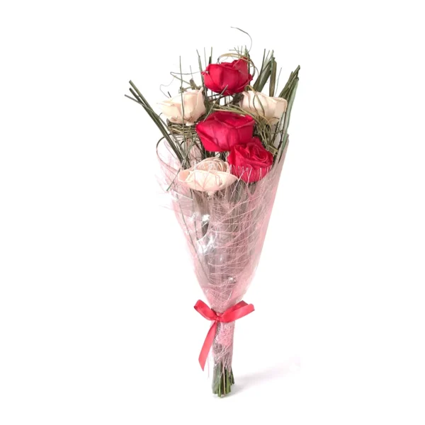 Arrangement AR41: a gift-wrapped bouquet of red and cream sola roses with green grass blades and curly grass