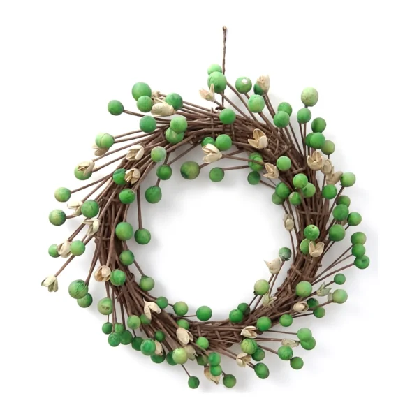 Arrangement AR46: a brown twig wreath scattered with green-dyed round ball heads