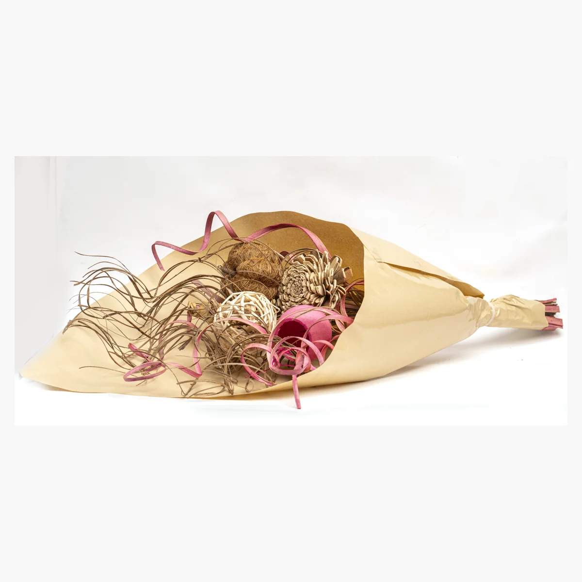 Kraft-Wrapped Dried Bouquet – Pink AR80: a pink and natural kraft-wrapped dried bouquet with rose-pink curled palm – view 3